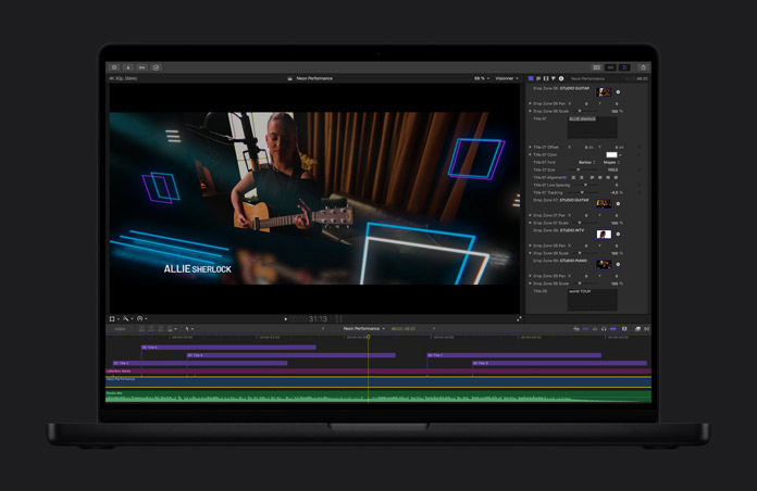 écran du MacBook Pro 16, Final Cut Pro, papillon monarque volant dans un champ, fleurs violettes et arbres en arrière-plan