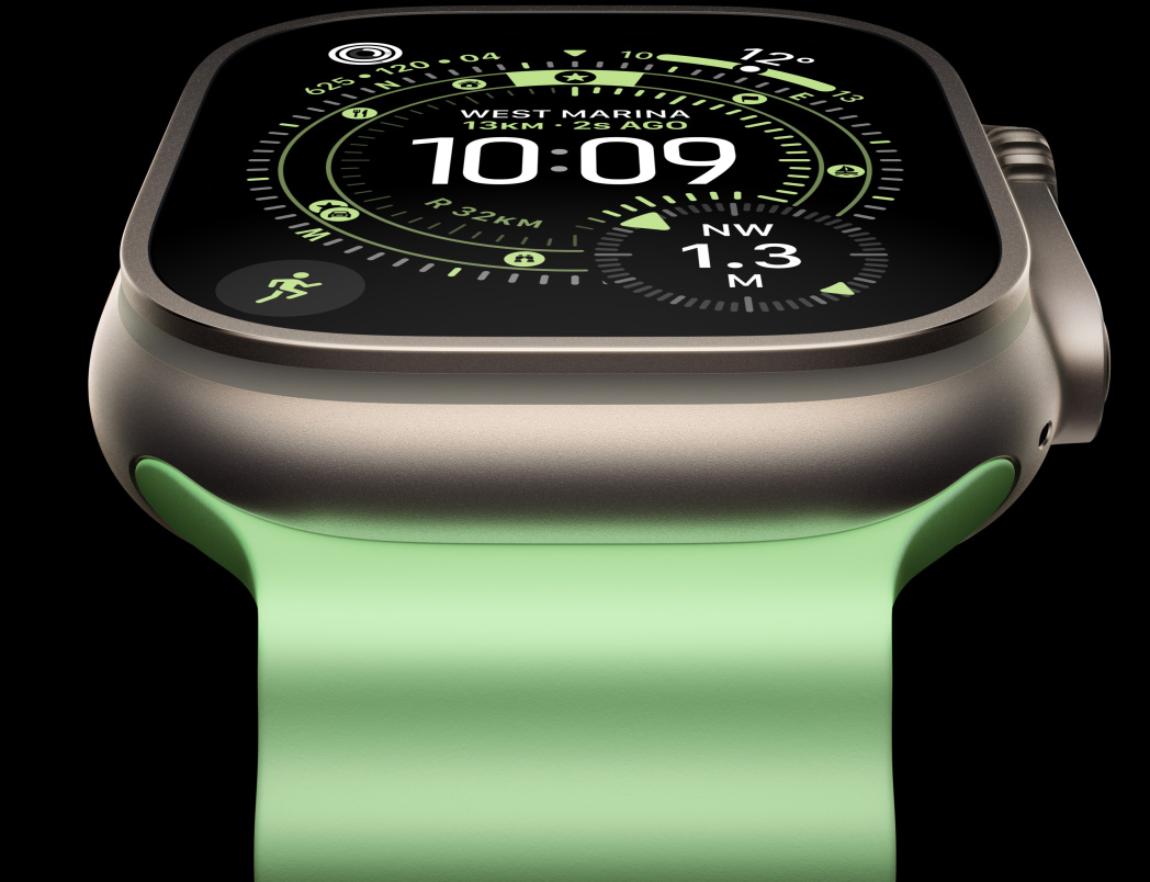 Apple Watch Ultra 3, κ?σα απ? τιτ?νιο, φυσικ? χρ?μα, πυξ?δα στην πρ?σοψη ρολογιο? Orienteering, λουρ?κι Ocean Band, ν?ον πρ?σινο χρ?μα